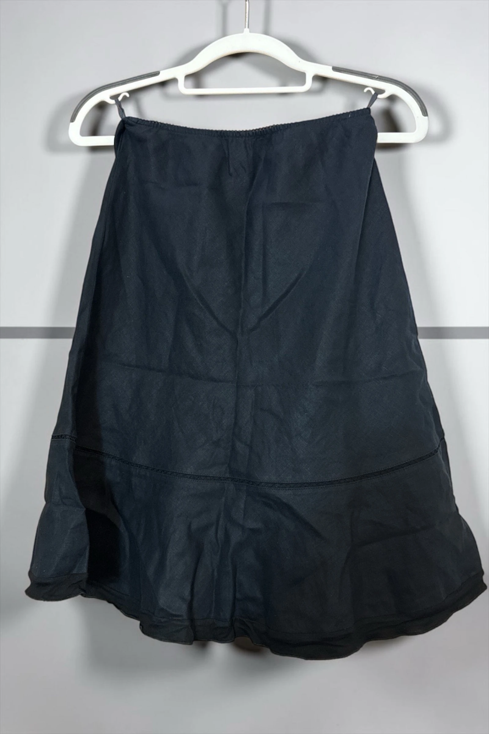 Falda negra evasé con volante T42/44 aprox.